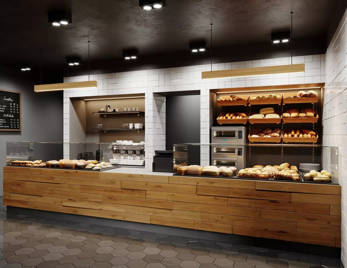 Bakery counter with bread and pastries in glass cases, plus shelves of loaves and rolls.